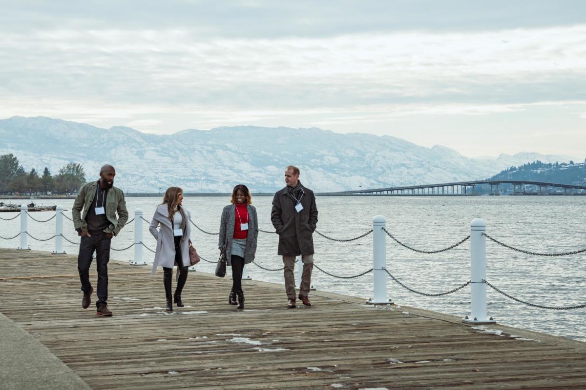 Meeting Group Walking on Boardwalk